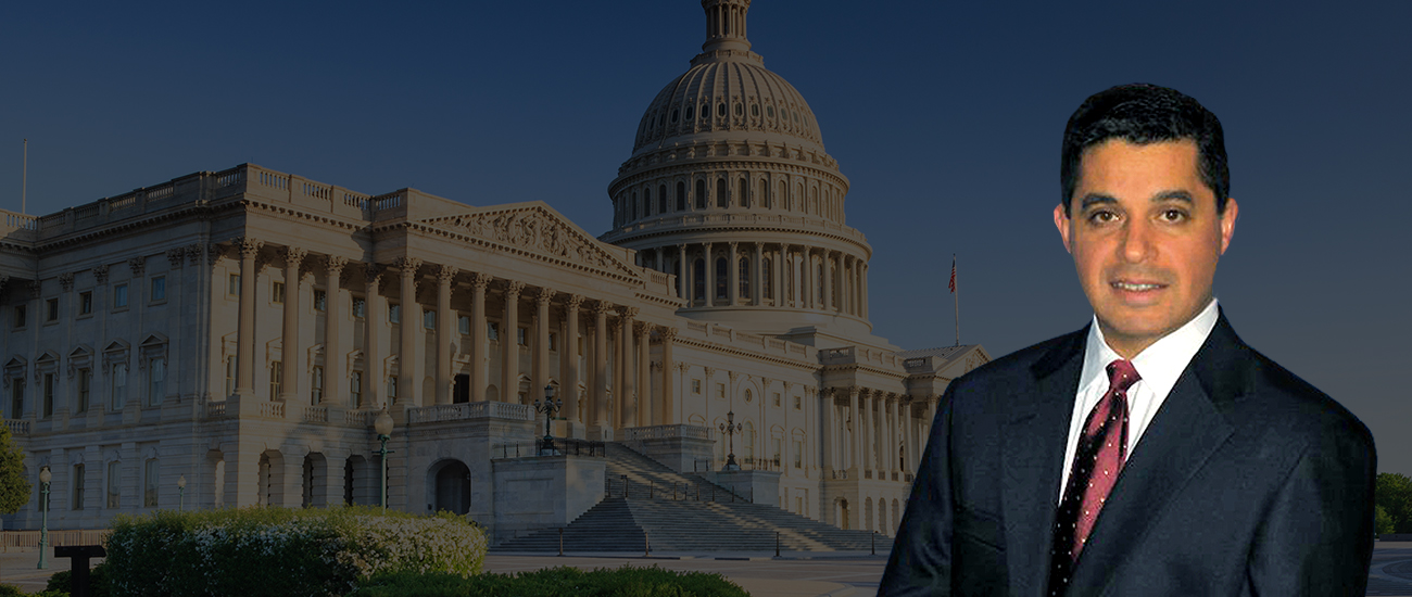 Photo of Joseph Ostad in front of the United States Capitol