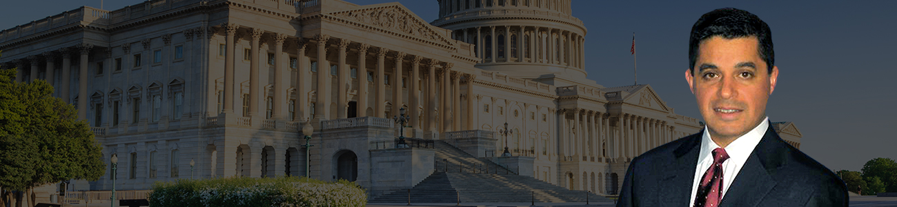 Photo of Joseph Ostad in front of the United States Capitol