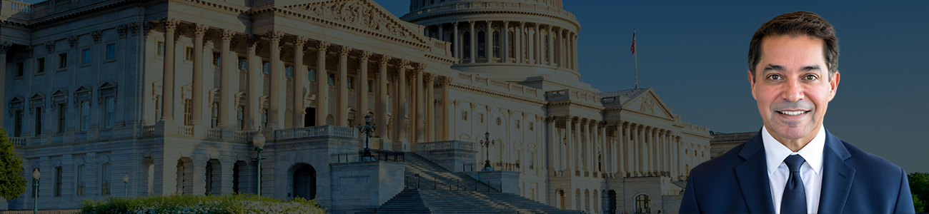 Photo of Joseph Ostad in front of the United States Capitol